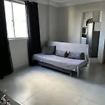 Apartamento novo ao lado do Rio Centro!
